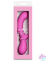 Pink curved silicone G-spot vibrator wand with ergonomic handle on a soft neutral background