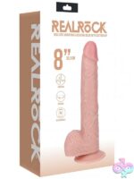 RealRock 8 inch vibrating and rotating realistic dildo with balls and suction cup base