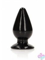 Realrock Crystal Clear 3.5 inch anal plug with suction cup base in four colors on a clean white background
