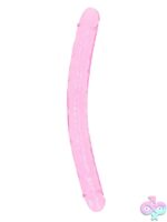 18-inch crystal clear double dong with suction cup base shown in four translucent colors