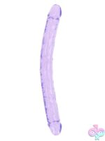 18-inch crystal clear double dong with suction cup base shown in four translucent colors