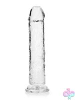 Realrock Crystal Clear straight realistic dildo with suction cup base standing upright on white background