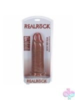Extra thick 9-inch tan realistic dildo with suction cup base and textured veining by Shots Toys