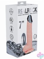 7-inch realistic vibrating dildo with solid metal tip and suction cup base in beige by Shots Toys