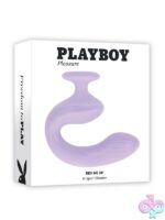 Purple dual motor curved G-spot vibrator with flexible textured shaft and ergonomic handle on a neutral background
