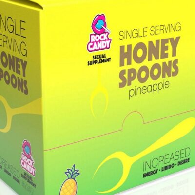24-count pineapple honey spoon supplement display in yellow by Rock Candy