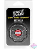 Rock Solid Gear cock ring in black and clear on a neutral background