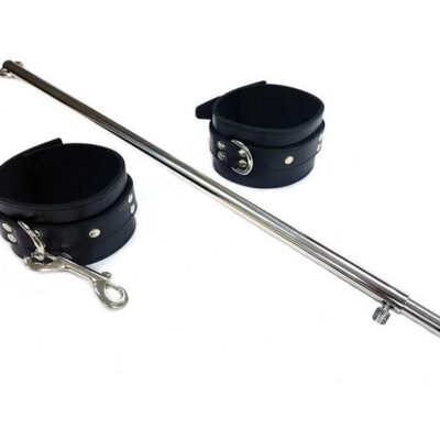 Adjustable black leather ankle cuff spreader bar extended to full length by Rouge Garments
