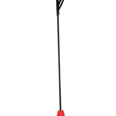 Rouge PVC riding crop in black and red on a dark surface showing wrist loop and flexible shaft