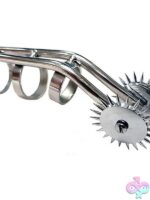 Finger-worn silver stainless steel cat claw pinwheel sensation tool by Rouge Garments