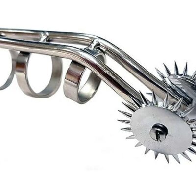 Finger-worn silver stainless steel cat claw pinwheel sensation tool by Rouge Garments