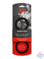 Black velvet-smooth silicone slip-on wrist restraints by Sei Mio