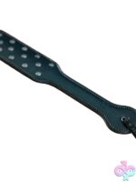 Purple leather punishment paddle with metal studs and smooth base by Sei Mio
