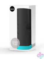 Sensetube VR-compatible vibrating male masturbator in black and white on a dark surface