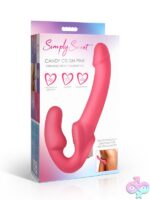 Pink vibrating strapless strap-on with textured clitoral pad and removable bullet vibe by Curve Novelties