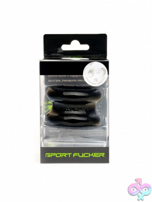 Sport Fucker Muscle Ball Stretcher Tpe In Black, Red, And White On Neutral Background