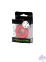 Red stretchy TPE donut cock ring by 665 Leather shown against neutral background
