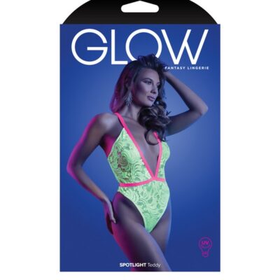 Neon green UV-reactive lace teddy with criss-cross straps and g-string back on model