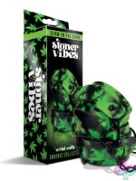 Glow-in-the-dark green wrist cuffs by Stoner Vibes Chronic Collection shown against dark background