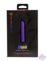 Sunni Nubii warming bullet vibrator in pink and purple on a soft neutral background