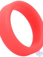Tantus Super Soft silicone c-ring in purple and red on neutral background
