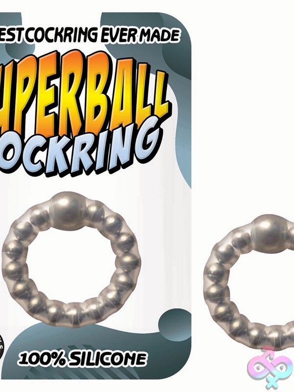 Discreet-Toys-Superball-Cockring-Clear-Nu-Nw3049 Clear Silver Silicone And Metal Superball Cockring By Nasstoys Against A Clean Neutral Background