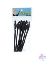Black groom-head novelty drinking straws by Shots Toys laid out on a festive bachelorette party table