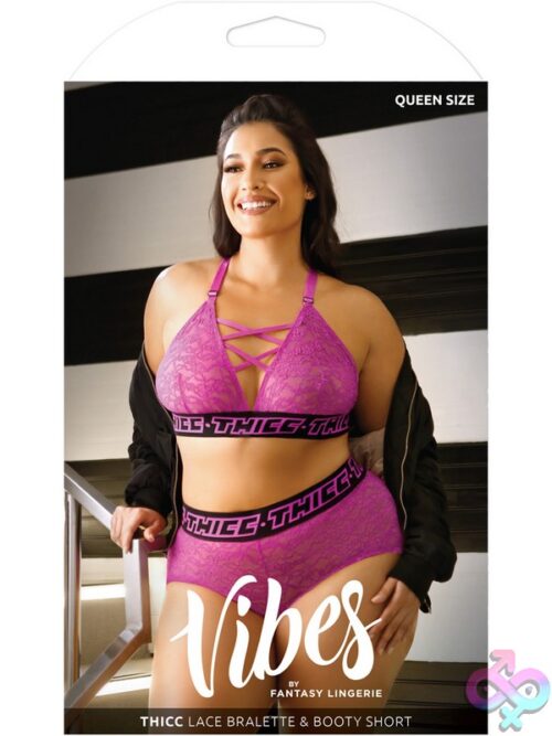 Purple Stretch Lace Triangle Bralette And Booty Short Set Laid Flat Showing Criss-Cross Neckline And Thicc Elastic Waistband