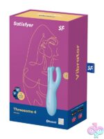 Satisfyer Threesome 4 lay-on vibrator with three flexible arms shown in pink on a neutral background