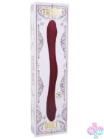 Bendable double-ended silicone vibrator in berry purple with wireless remote by Doc Johnson
