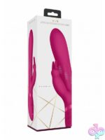 Pink beaded rabbit vibrator with three motors and clitoral arm in medical-grade silicone by Shots Toys