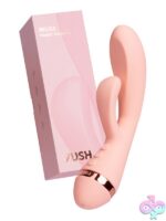 Pink medical-grade silicone rabbit vibrator with dual stimulation arms by Vush