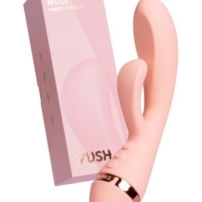 Pink medical-grade silicone rabbit vibrator with dual stimulation arms by Vush