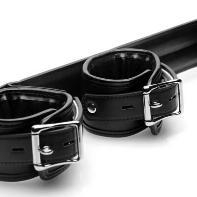 Spreader Bar by XR Brands — black leather and metal bondage positioning bar with padded adjustable cuffs