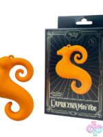 Capricorn mini vibe in orange liquid silicone by Our Erotic Journey — compact clit stimulator with 10 vibration modes