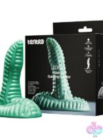 Alien tail rotating grinder in green with suction-cup base and remote control by Tentra